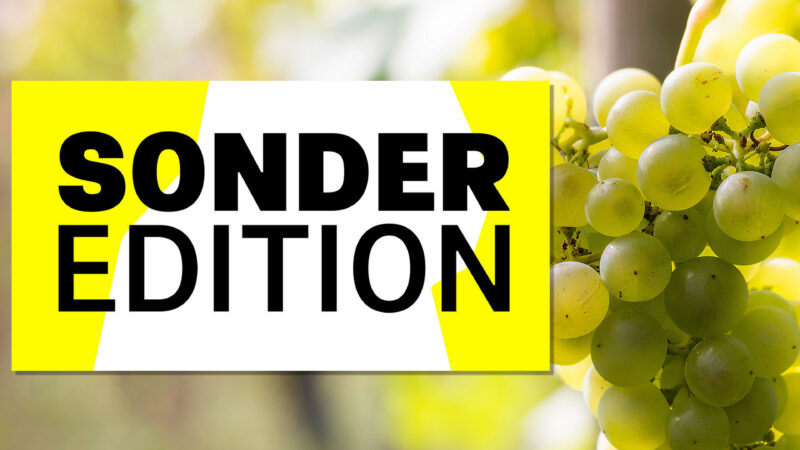 Logo mit dem Text 'SONDER EDITION' und grünen Trauben im Hintergrund.