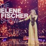 Die Helene Fischer Show": Helene Fischer steht auf der Bühne und singt in ein Handmikrofon. Im Hintergrund ist das Sendungslogo.