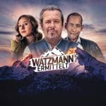 Offizielles Key-Visual zur ARD-Serie "Watzmann ermittelt" mit drei Hauptdarstellern vor einer Bergkulisse im Sonnenuntergang. Im Vordergrund das Logo der Serie, ein stilisierter Watzmann-Gipfel mit Schriftzug.