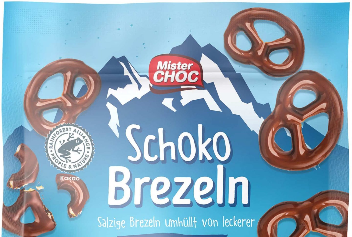 Verpackung der „MisterChoc Schoko Brezeln“ von Lidl in Vollmilchschokolade (140g). Die Verpackung ist blau mit einem Bergmotiv und zeigt mehrere mit Schokolade überzogene Brezeln. Enthält 60 % Vollmilchschokolade.