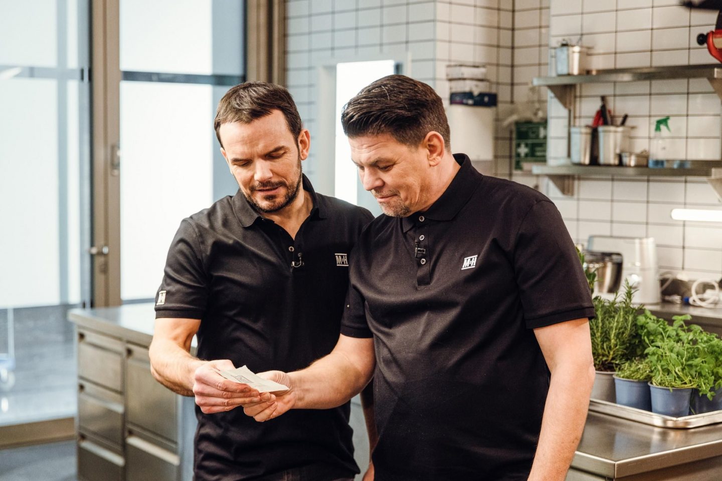 Tim Mälzer (l.), Steffen Henssler